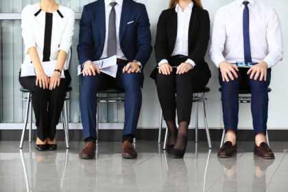 Business People Waiting For Job Interview. Four Candidates Compe